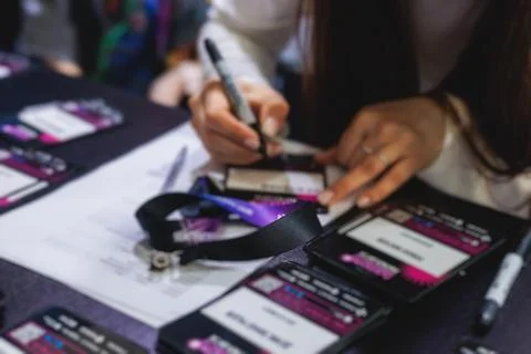 Process of checking in on a conference congress forum event, registration d.. 스톡 사진