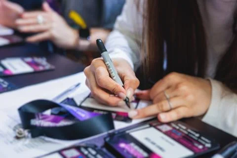 Process of checking in on a conference congress forum event, registration d.. 스톡 사진