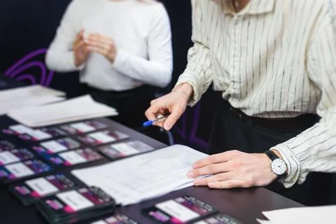 Process of checking in on a conference congress forum event, registration d.. 스톡 사진