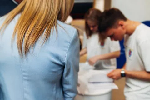 Process of checking in on conference congress forum event, registration des.. Stock Photos