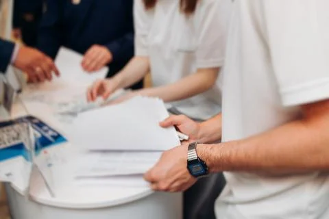 Process of checking in on conference congress forum event, registration des.. Stock Photos