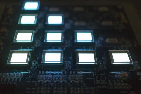 The process of checking several oled displays on the test station. Displays g Stock Photos