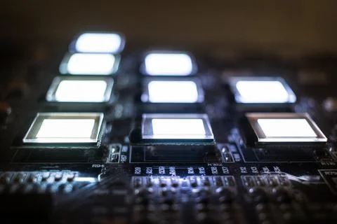 The process of checking several oled displays on the test station. Displays g Stock Photos