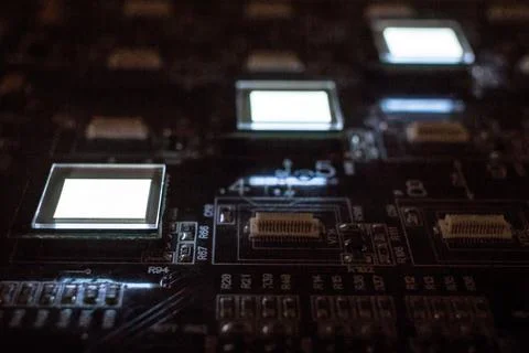 The process of checking several oled displays on the test station. Displays g Stock Photos