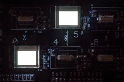 The process of checking several oled displays on the test station. Displays g Stock Photos
