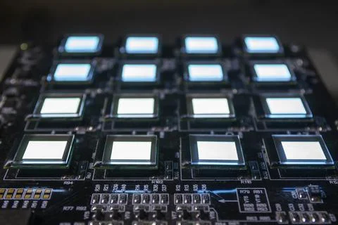 The process of checking several oled displays of white color on the test stat Stock Photos