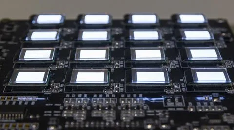 The process of checking several oled displays of white color on the test stat Stock Photos