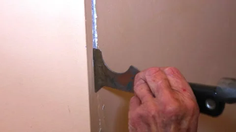Process Of Chipping Out Crack In Drywall Stock Footage 145825501