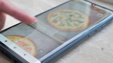 The process of choosing and ordering takeaway pizza online in a mobile Stock Footage 205367375