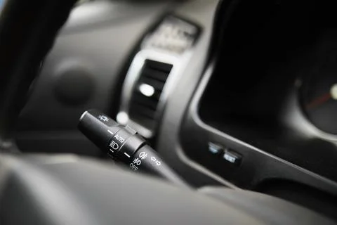 The process of choosing climate control in the car. Various controls in aut.. Stock Photos