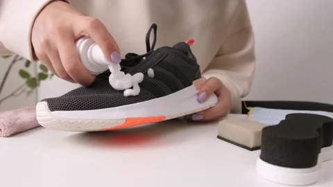 The process of cleaning and caring for athletic sneakers. Stock Footage 196005866