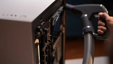 Process cleaning computer case with vacuum cleaner, removing dust, preventing Stock Footage 292021245