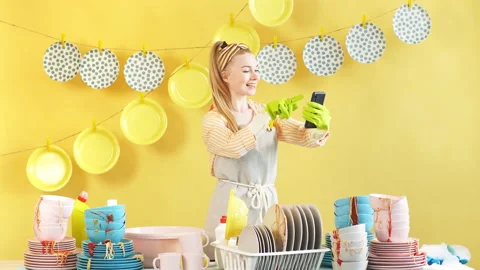 Process of cleaning dishes after birthday Stock Footage 108516137