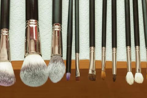Process of cleaning drying makeup brushes Stock Photos