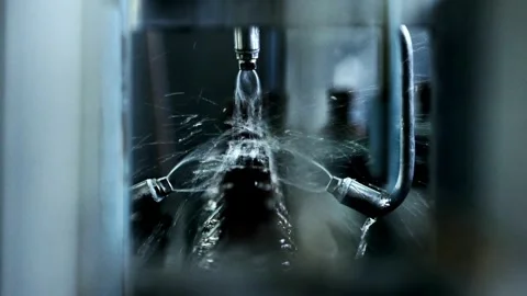 Process of Cleaning empty plastic bottle for mineral water modern industry Stock Footage 334587725