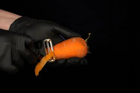 The process of cleaning fresh carrots Stock Photos