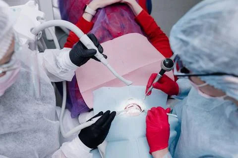 The process of cleaning teeth. Top view Stock Photos