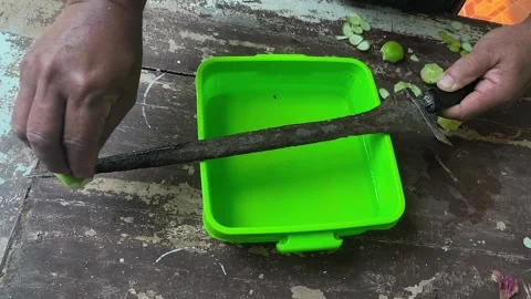 The process of cleaning traditional weapons like the keris. Stock Footage 341746328