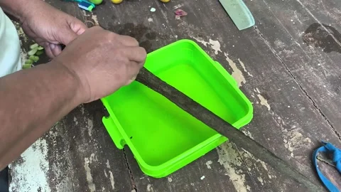 The process of cleaning traditional weapons like the keris. Stock Footage 341747382