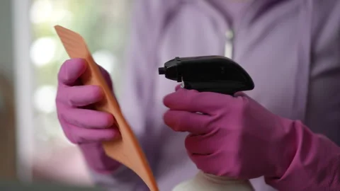 The process of cleaning your hands effectively using a spray bottle and a cloth  Stock Footage 309379526