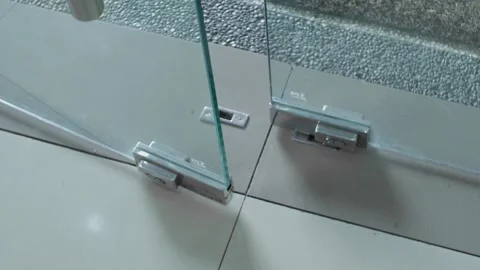 The process of closing a large glass door in an office Stock-Footage 242225117