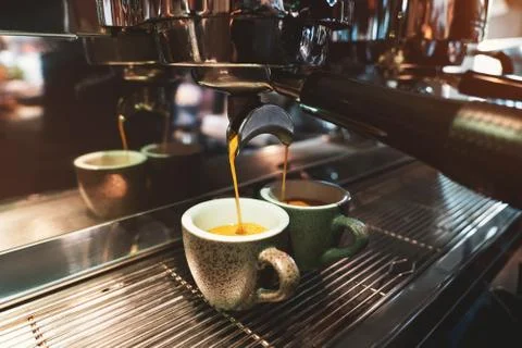 Process of coffee drink making using professional coffee machine Stock Photos