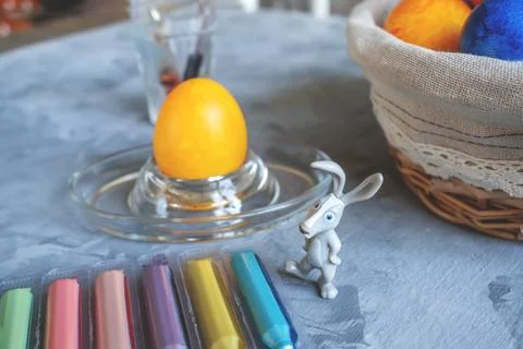 Process of coloring eggs for the Easter holiday using ampoules with dye. Di.. Stock Photos