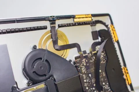 Process of computer repair. Engineer in white gloves disassembling computer. Stock Photos