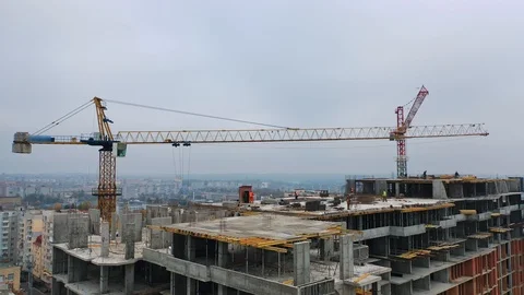 Process of construction high-rise building. Labor workers on a big construction Stock Footage 119151136