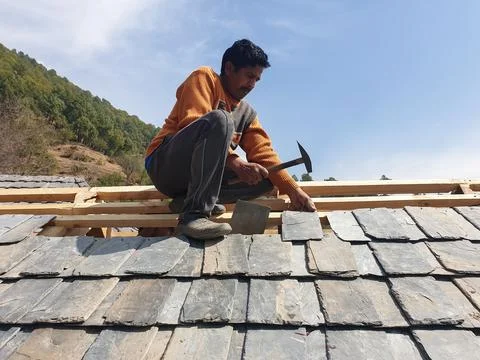 Process of construction work of rooftop 写真素材