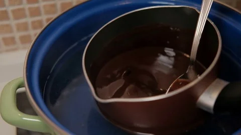 Process of cooking and melt the hot chocolate Stock Footage 79527239