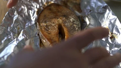 Process of cooking the baked salmon steak Stock Footage 105998649