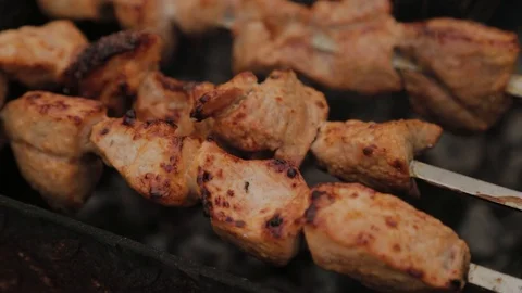 The process of cooking barbecue on fire in winter weather on a background of Video stock 124147404