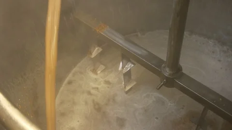 Process of cooking beer in brewery tank. Stock Footage 89422723