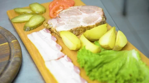 The process of cooking a burger with salad and piccul Stock Footage 101897420