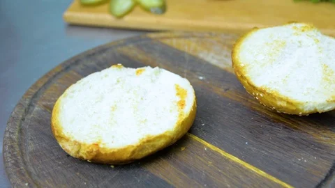 The process of cooking a burger with salad and piccul Stock Footage 101897501