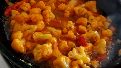 The process of cooking cauliflower in sweet and sour sauce. Stock Footage 172181644