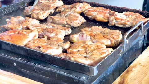 The process of cooking chicken steak on the grill Stock Footage 237478902