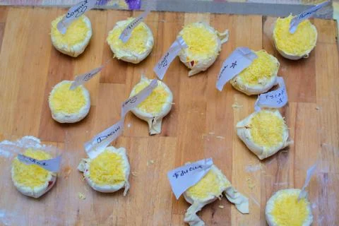 The process of cooking children's baskets of tomatoes and cheese Stock Photos