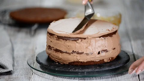 Process of cooking chocolate sponge cake. Step by step assembly chocolate cake Stock Footage 102970938