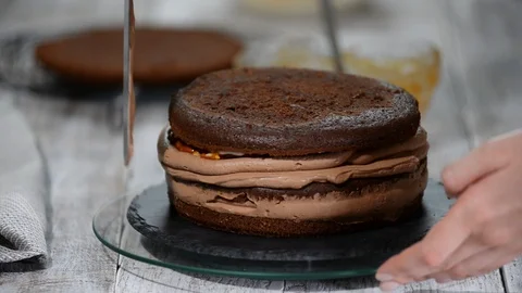 Process of cooking chocolate sponge cake. Step by step assembly chocolate cake. Stock Footage 103248791