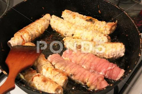 Process Of Cooking Of Chops On The Pan