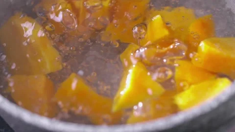 Process of cooking cream pumpkin soup slow motion. Ingredients for soup in Video stock 146212249