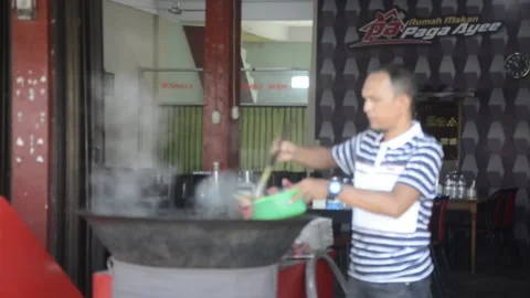 The process of cooking the culinary cork fish typical of Aceh Indonesia Stock Footage 133417853