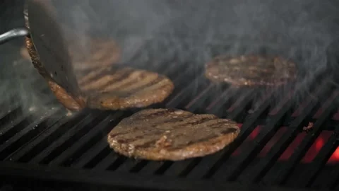 Process of cooking cutlet for a burger. Stock Footage 151645800
