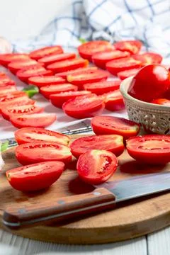 Process of cooking dried tomatoes. Stock Photos