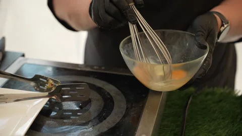 The process of cooking food in a hot pan from different ingredients Stock Footage 313668564