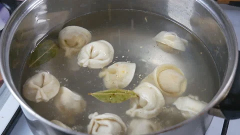 Process of cooking homemade dumplings. View from above. Close-up. Stock Footage 106773960