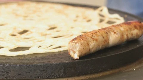 Process of cooking hot dog on a electric tile 库存影片 82956557