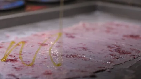 The process of cooking an ice cream roll in a freezer. Stock Footage 89442402